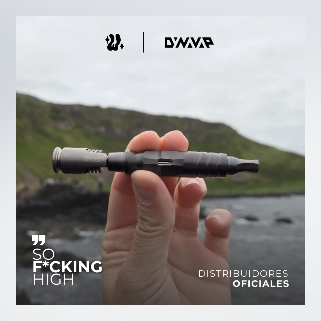Person holding DynaVap HyperDyn vaporizer against a scenic background, showcasing its sleek titanium design.